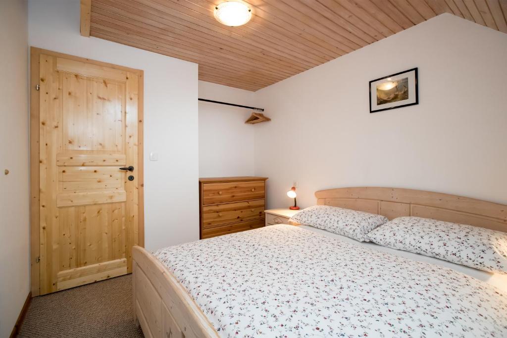 Postel nebo postele na pokoji v ubytování Apartments Markež