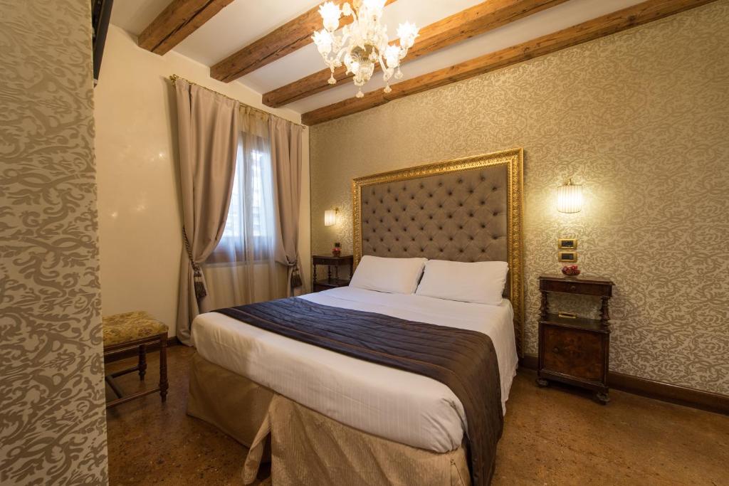 Postel nebo postele na pokoji v ubytování Palazzo Bembo - Exclusive Accommodation