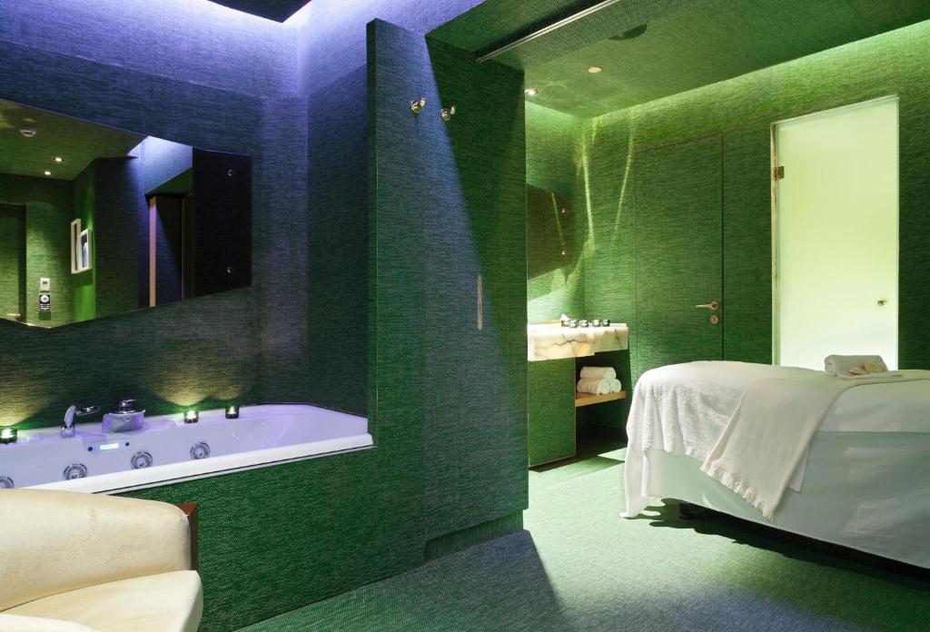 Postel nebo postele na pokoji v ubytování New Hotel