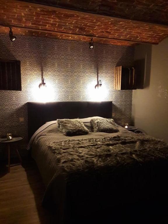 Postel nebo postele na pokoji v ubytování Gîte de Corbion loft2