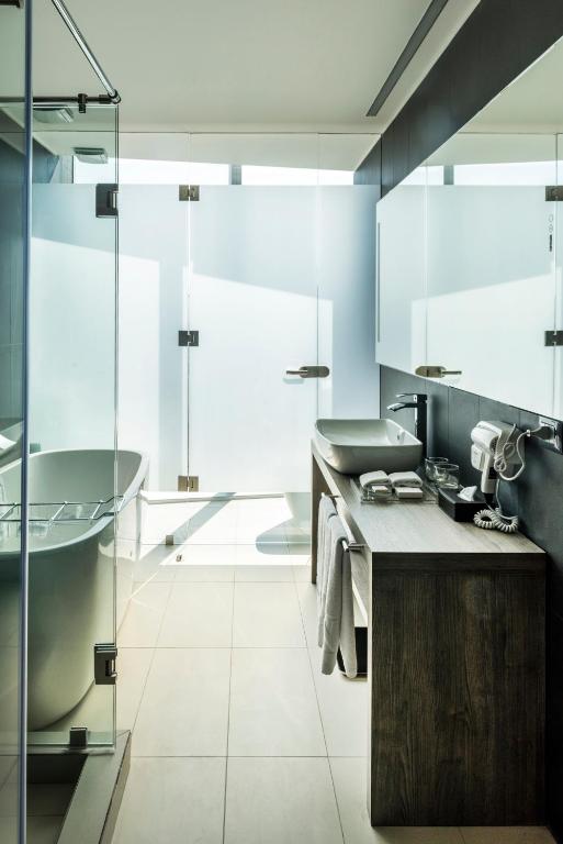 Kuchyň nebo kuchyňský kout v ubytování Icon Hotel