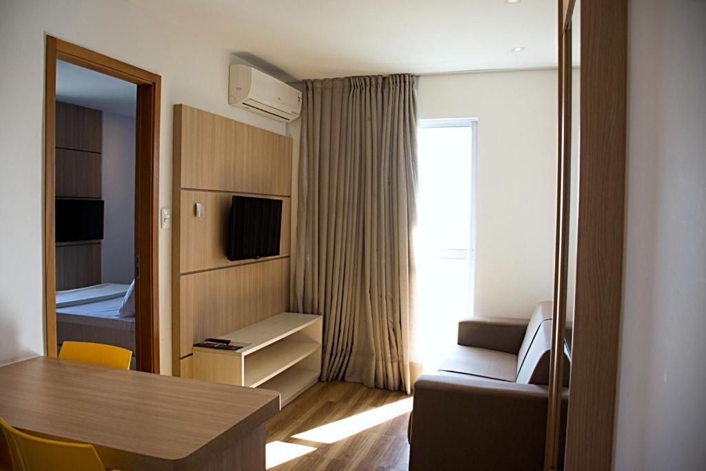 TV a/nebo společenská místnost v ubytování Unico Apart Hotel