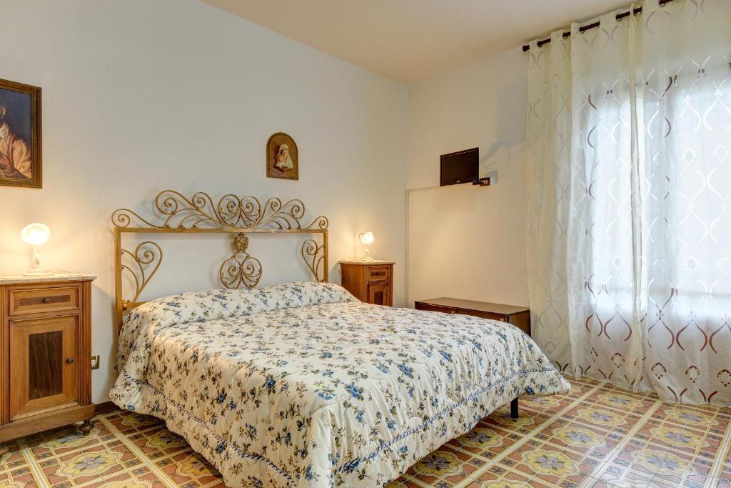 Postel nebo postele na pokoji v ubytování B&B Il Pozzo