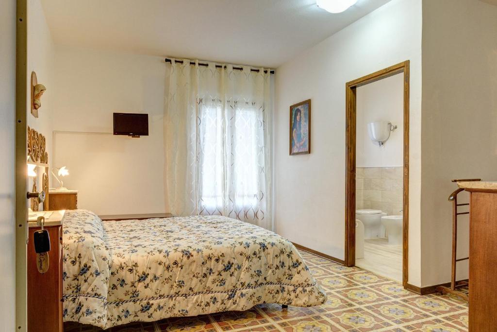 Postel nebo postele na pokoji v ubytování B&B Il Pozzo