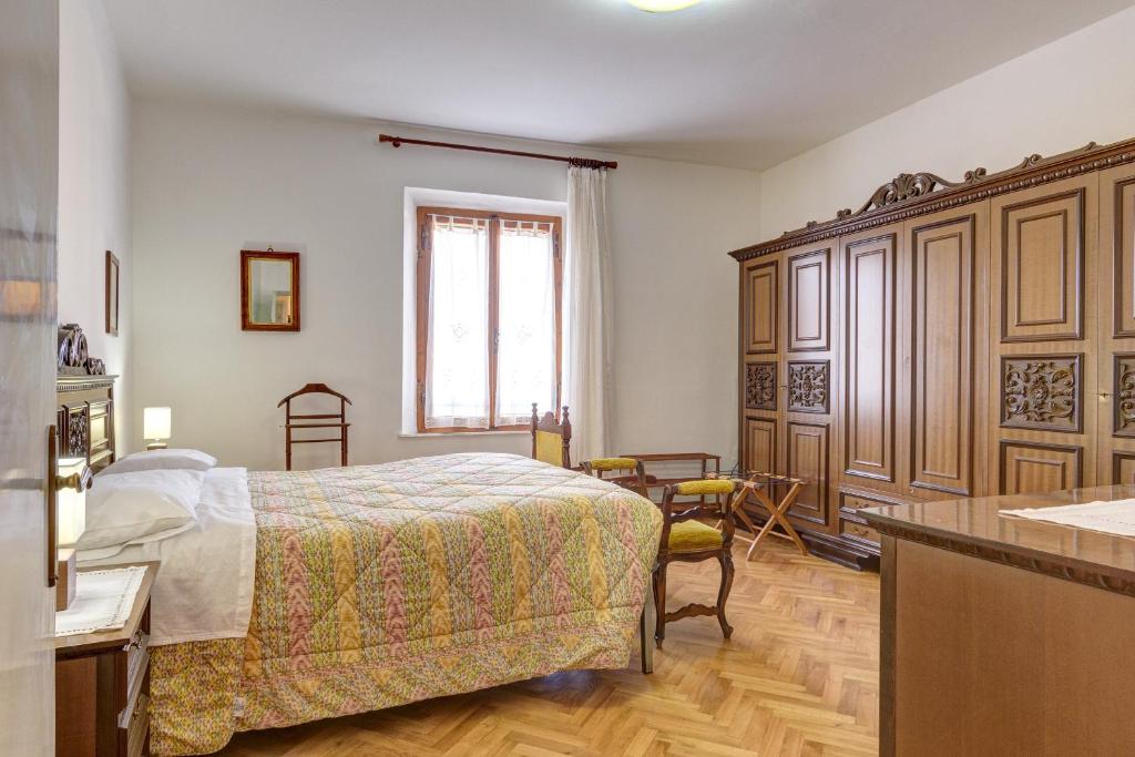 Postel nebo postele na pokoji v ubytování B&B Il Pozzo
