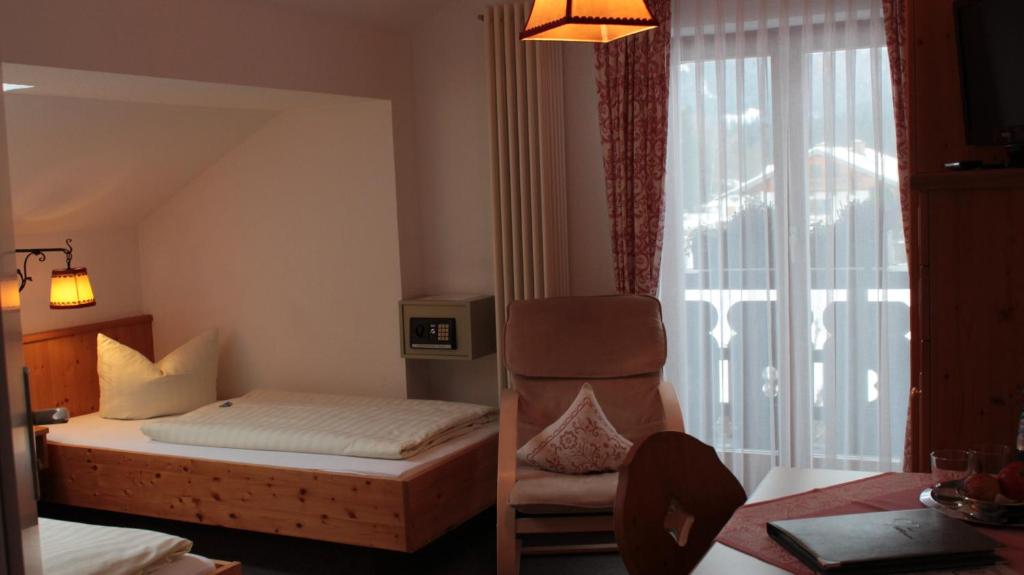 Postel nebo postele na pokoji v ubytování Haus Florian