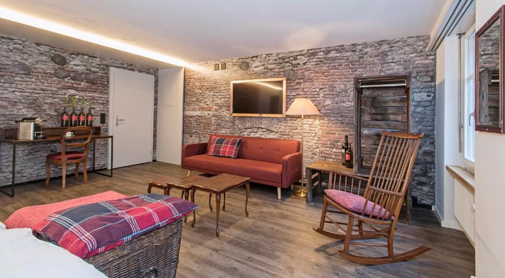 TV a/nebo společenská místnost v ubytování Hotel 2B