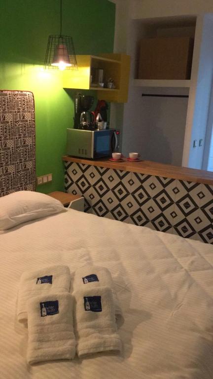 Posteľ alebo postele v izbe v ubytovaní White Bottle Superior Apartments