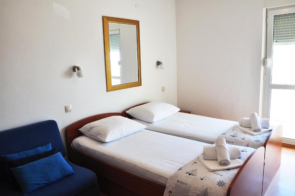 Posteľ alebo postele v izbe v ubytovaní Sunrise Apartments and Studio Apartments