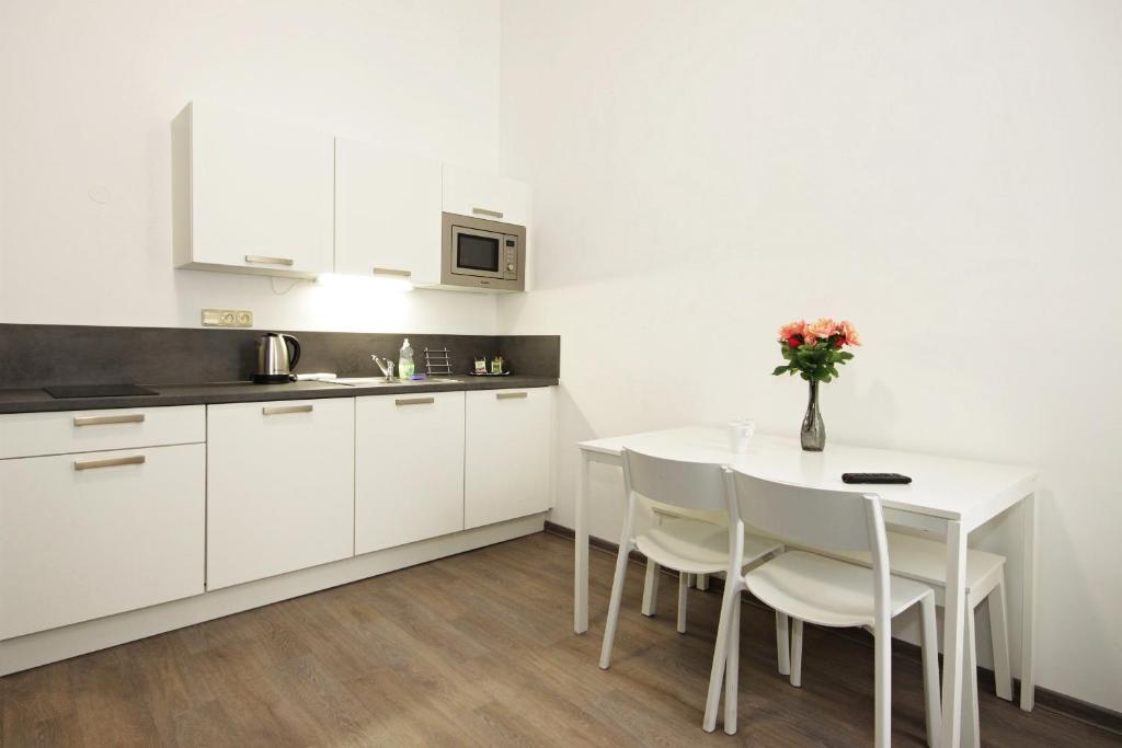 Kuchnia lub aneks kuchenny w obiekcie Alveo Suites