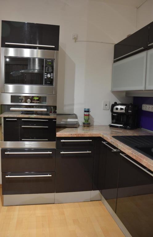 Kuchyň nebo kuchyňský kout v ubytování Apartmán Zderadova