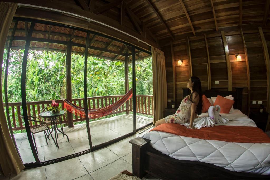 Postel nebo postele na pokoji v ubytování Hotel Rancho Cerro Azul