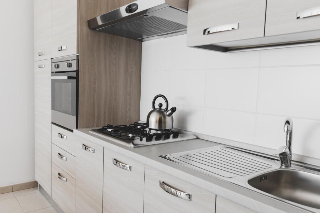 Kuchyň nebo kuchyňský kout v ubytování Agriturismo Statale 17