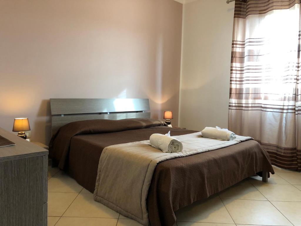 Postel nebo postele na pokoji v ubytování Bono Vacanze Villa San Marco Luxury Holidays Homes