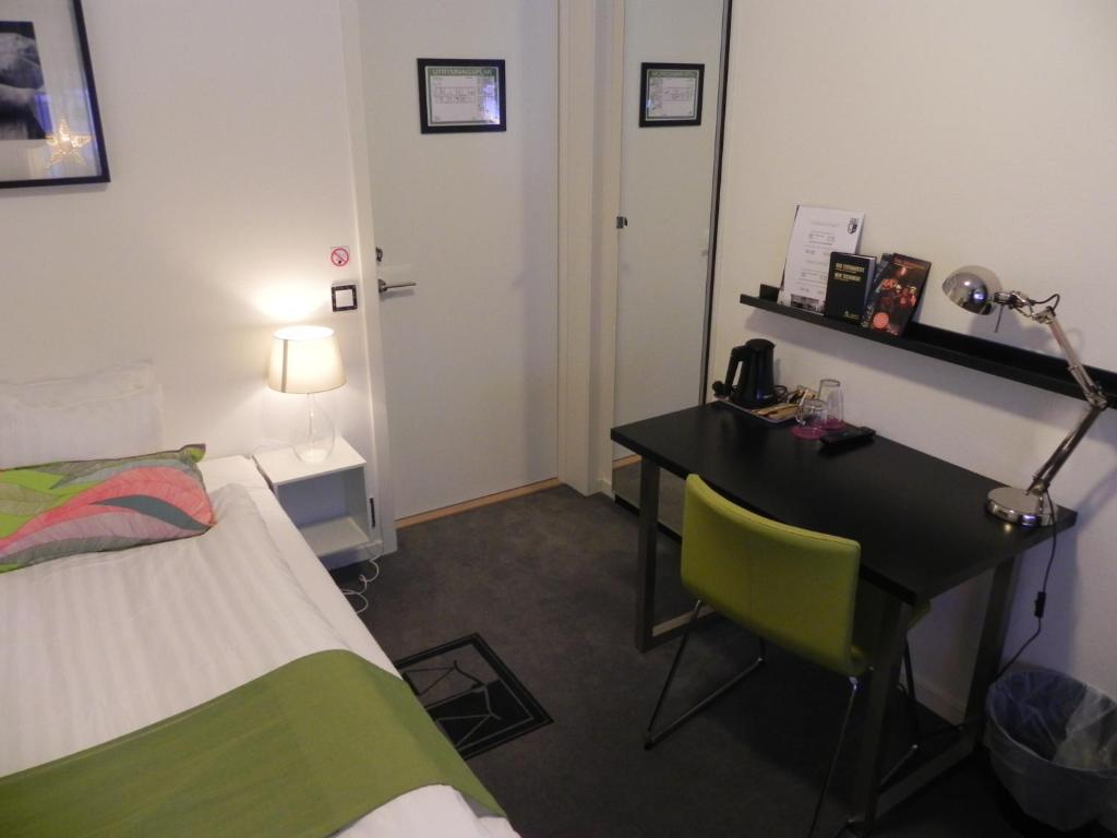 Postel nebo postele na pokoji v ubytování Hotell Tinget