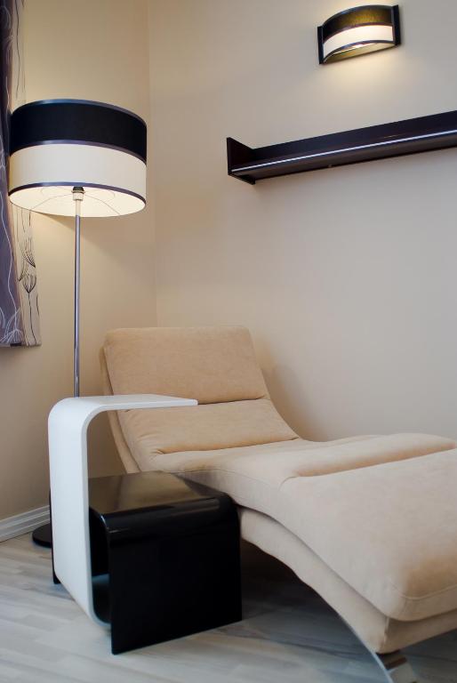 Postel nebo postele na pokoji v ubytování Soleil Apartman Szeged