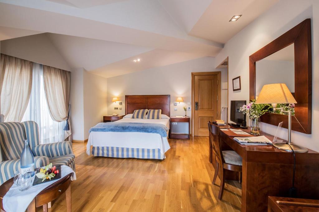Postel nebo postele na pokoji v ubytování Hotel Villa Virginia