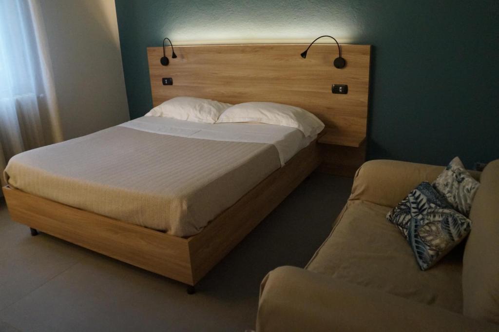 Postel nebo postele na pokoji v ubytování Casa Chiara B&B