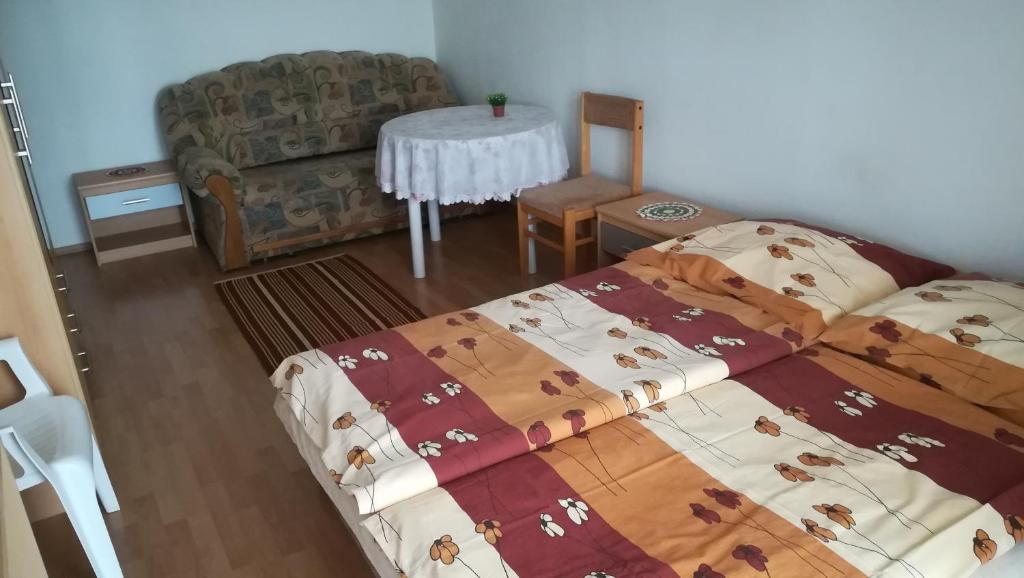 Postel nebo postele na pokoji v ubytování Privat Luptak