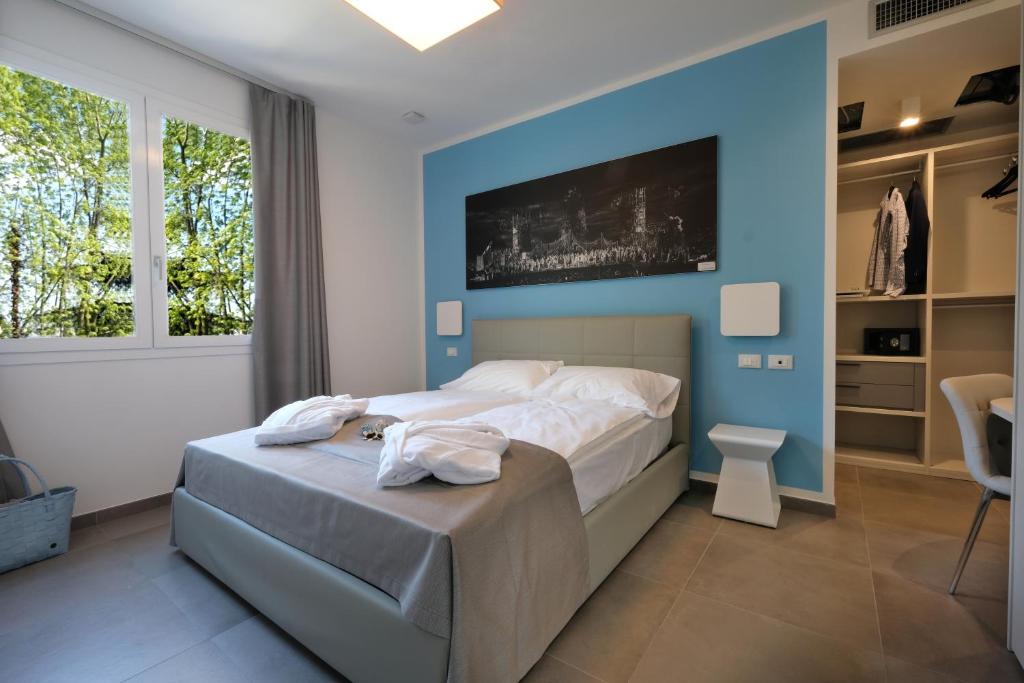 Postel nebo postele na pokoji v ubytování Relais Villa Clodia