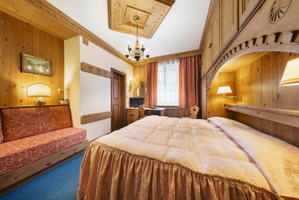 Łóżko lub łóżka w pokoju w obiekcie Hotel Columbia & Spa
