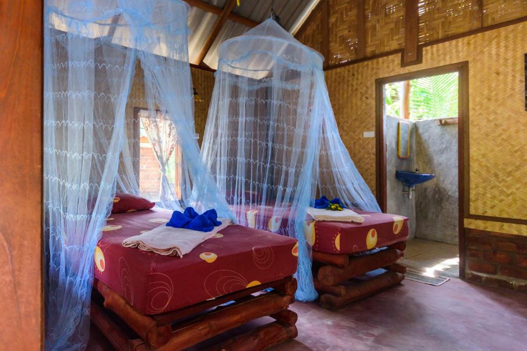 Cama o camas de una habitación en Rakkan Resort