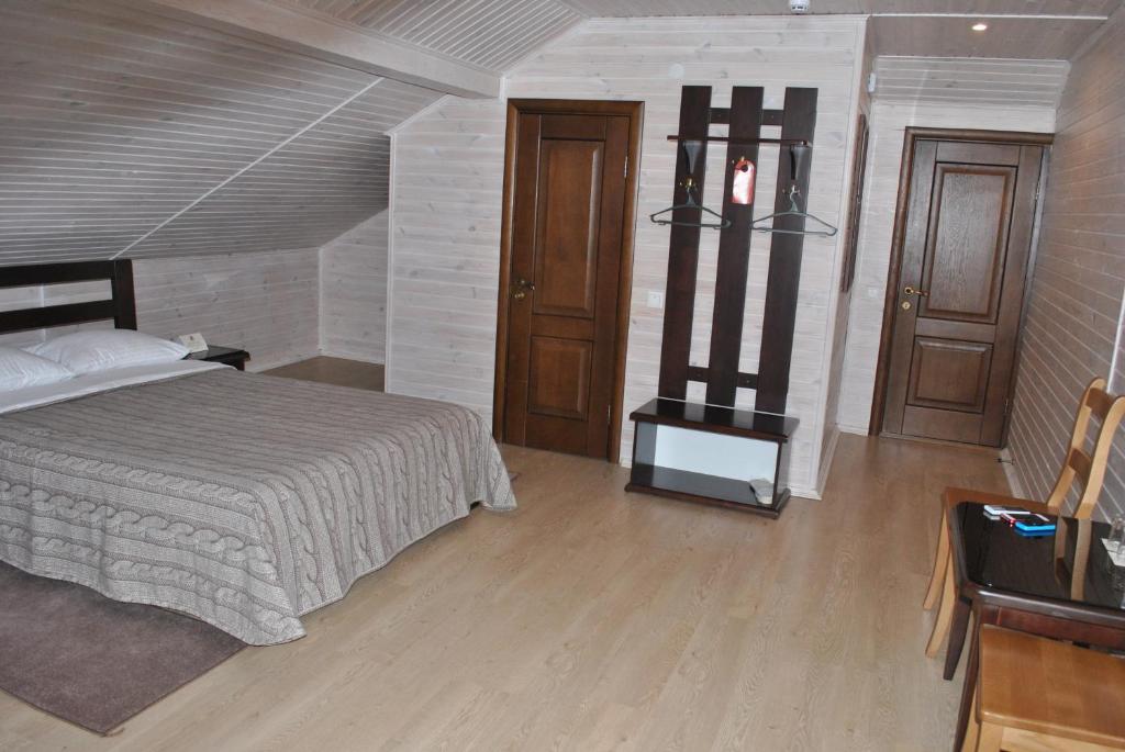 Postel nebo postele na pokoji v ubytování Hermes