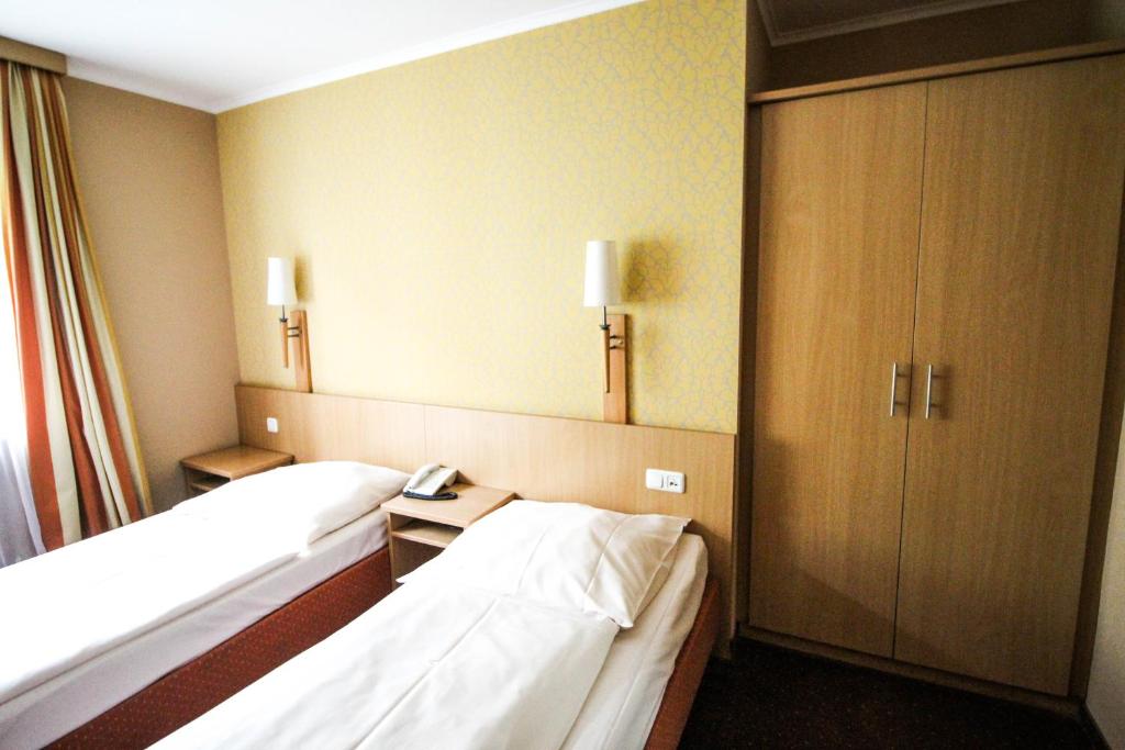 Postel nebo postele na pokoji v ubytování Jagerhof