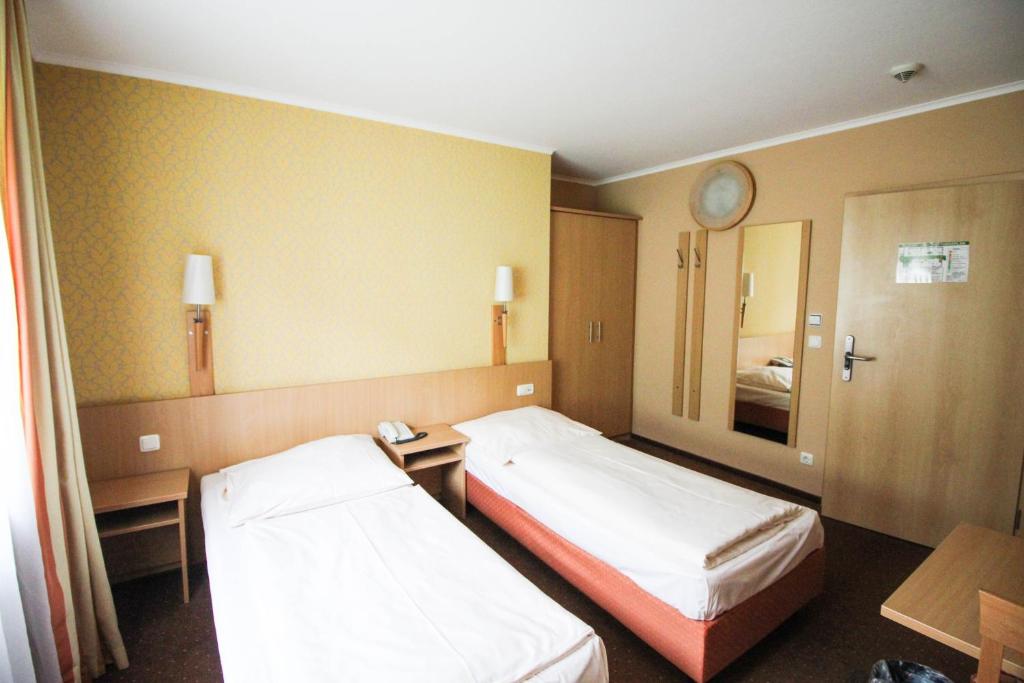 Postel nebo postele na pokoji v ubytování Jagerhof