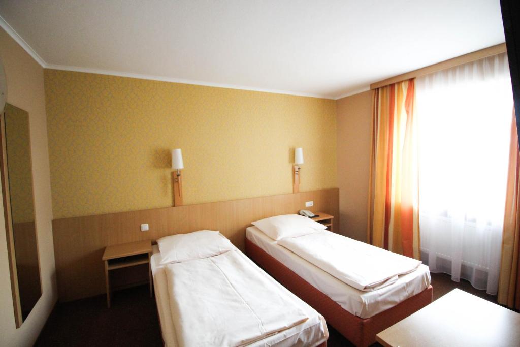 Postel nebo postele na pokoji v ubytování Jagerhof