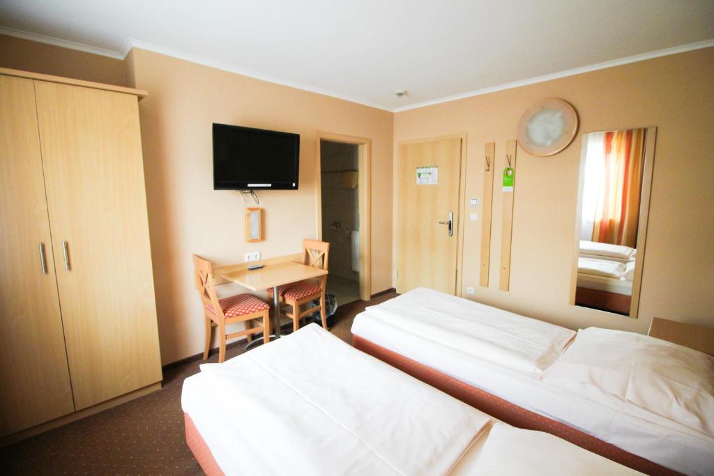 Postel nebo postele na pokoji v ubytování Jagerhof