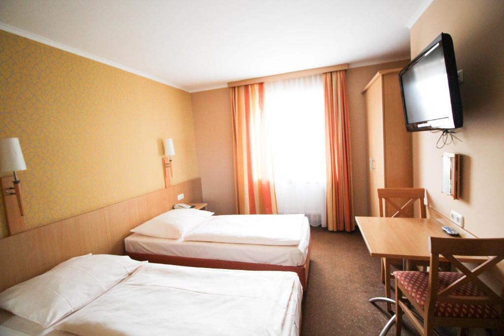 Postel nebo postele na pokoji v ubytování Jagerhof