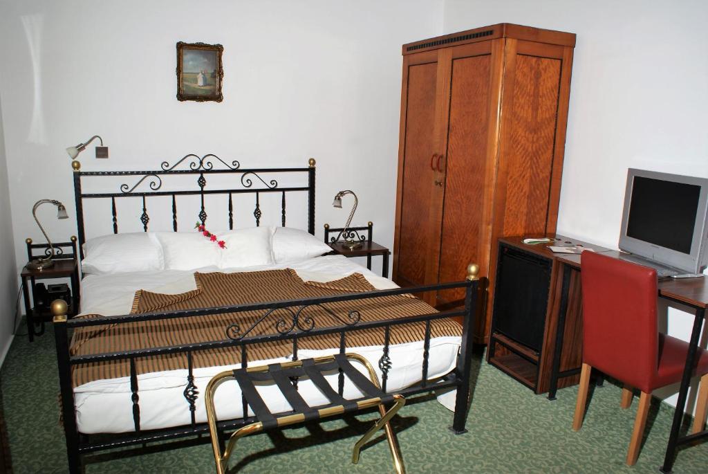 Postel nebo postele na pokoji v ubytování Hotel park