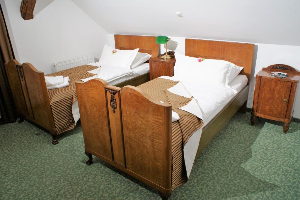 Postel nebo postele na pokoji v ubytování Hotel park