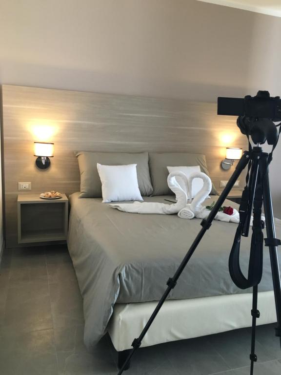 Posteľ alebo postele v izbe v ubytovaní Hotel Orizzonte Blu