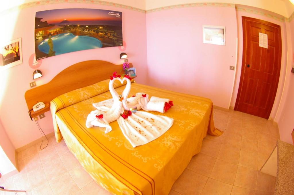 Posteľ alebo postele v izbe v ubytovaní Hotel Orizzonte Blu