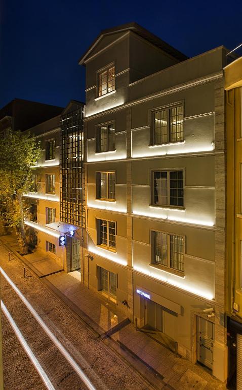 a building with lights on the side of it at Fer Hotel in Istanbul