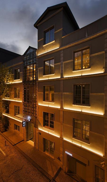 a building with lights on the side of it at Fer Hotel in Istanbul