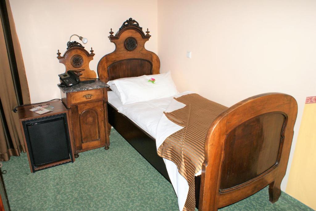 Postel nebo postele na pokoji v ubytování Hotel park