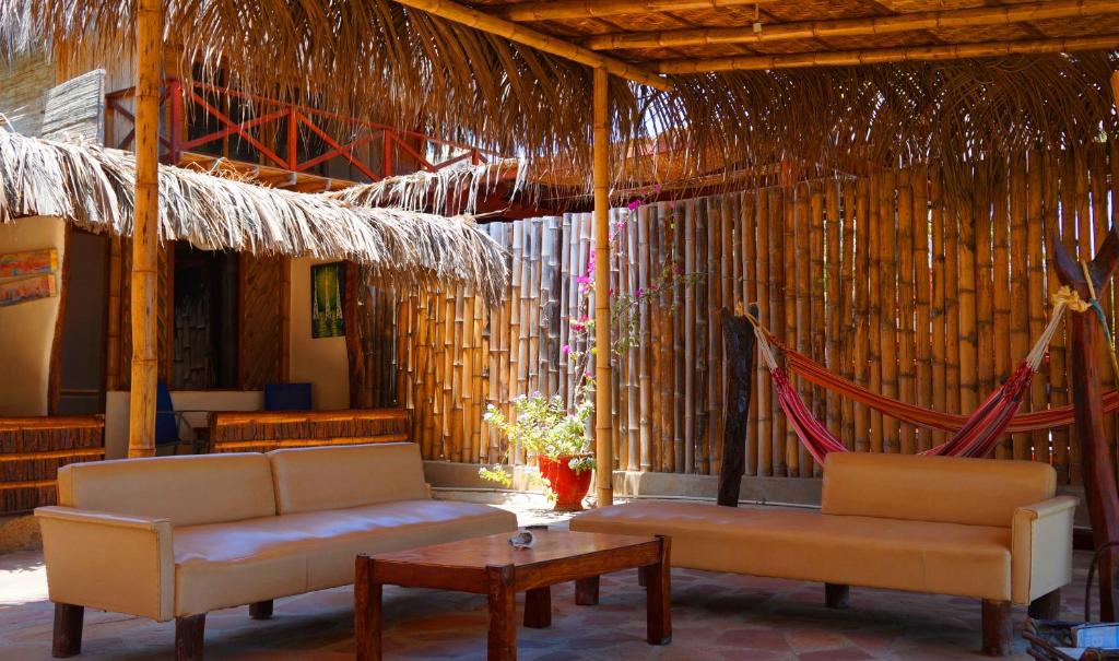 Posezení v ubytování Muelle Viejo Bungalows