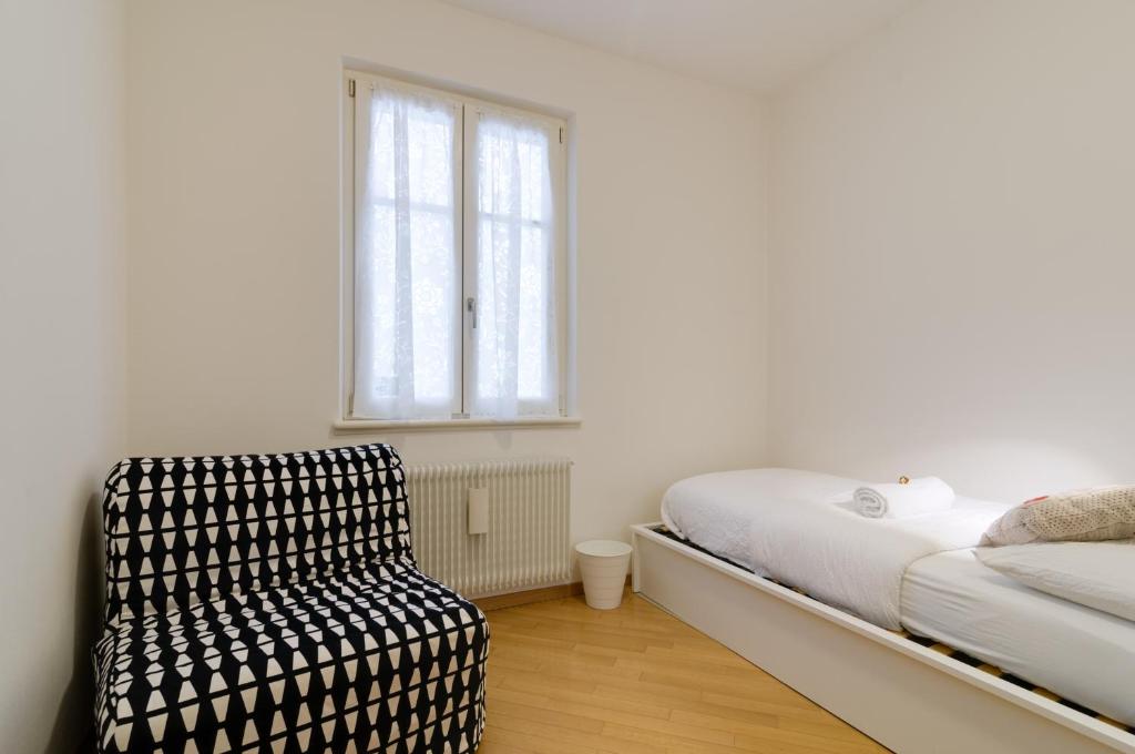 Letto o letti in una camera di B&B and Apartments Al Duomo