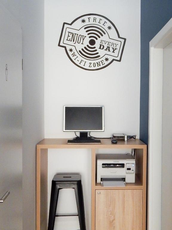TV a/nebo společenská místnost v ubytování Chesscom Guesthouse