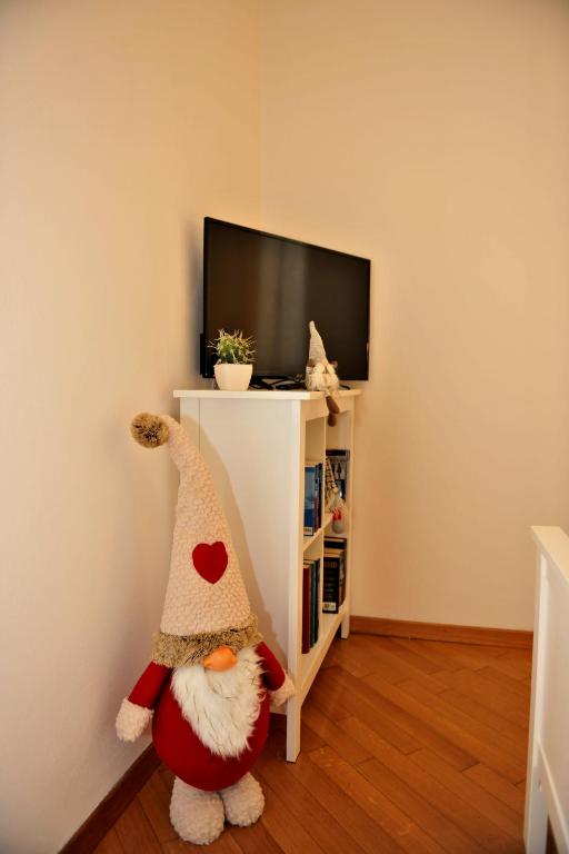TV o dispositivi per l'intrattenimento presso B&B and Apartments Al Duomo