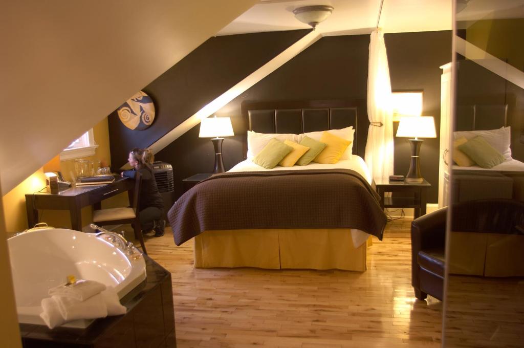 En eller flere senge i et værelse på Leaside Manor