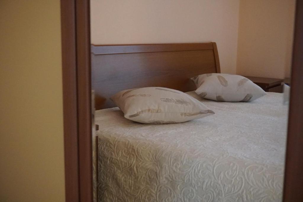 Posteľ alebo postele v izbe v ubytovaní Apartment Kozina