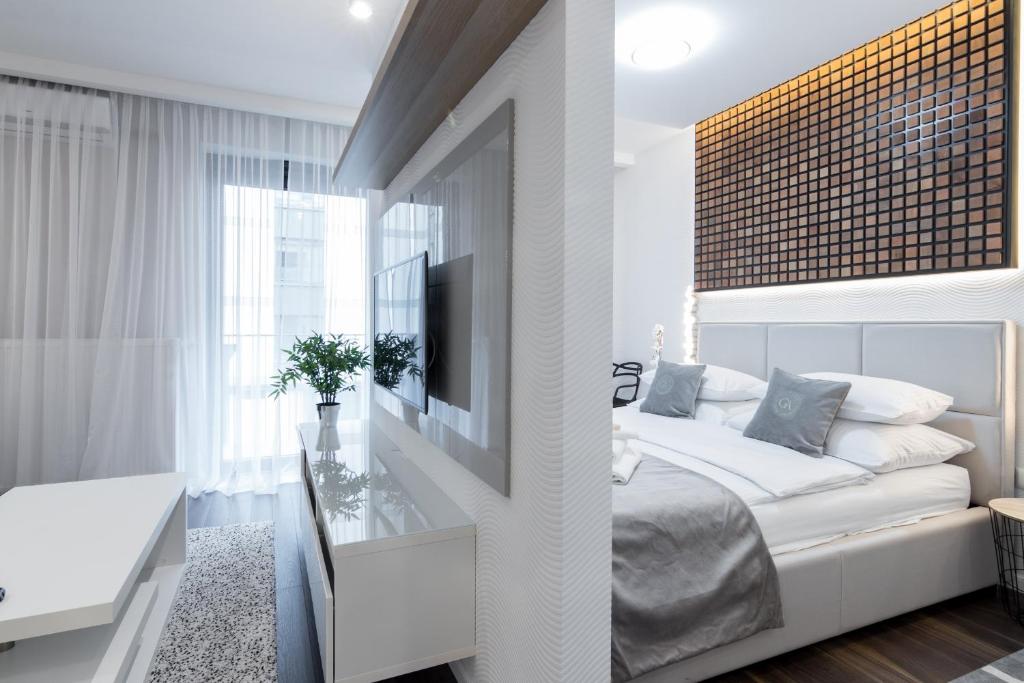 Posteľ alebo postele v izbe v ubytovaní GA Luxury Apartments W19
