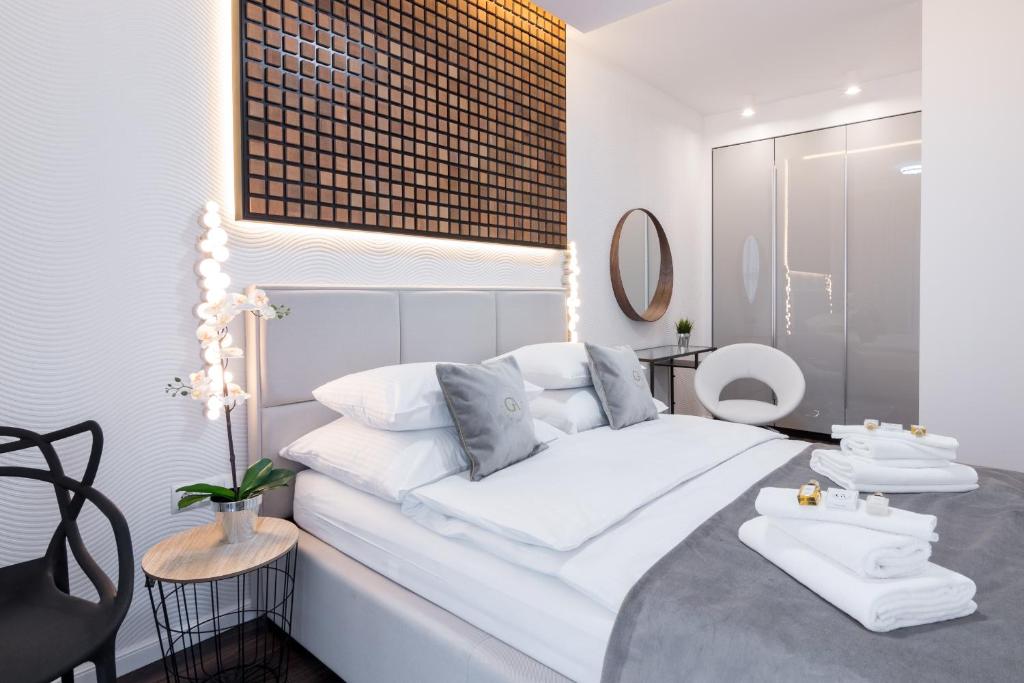 Posteľ alebo postele v izbe v ubytovaní GA Luxury Apartments W19