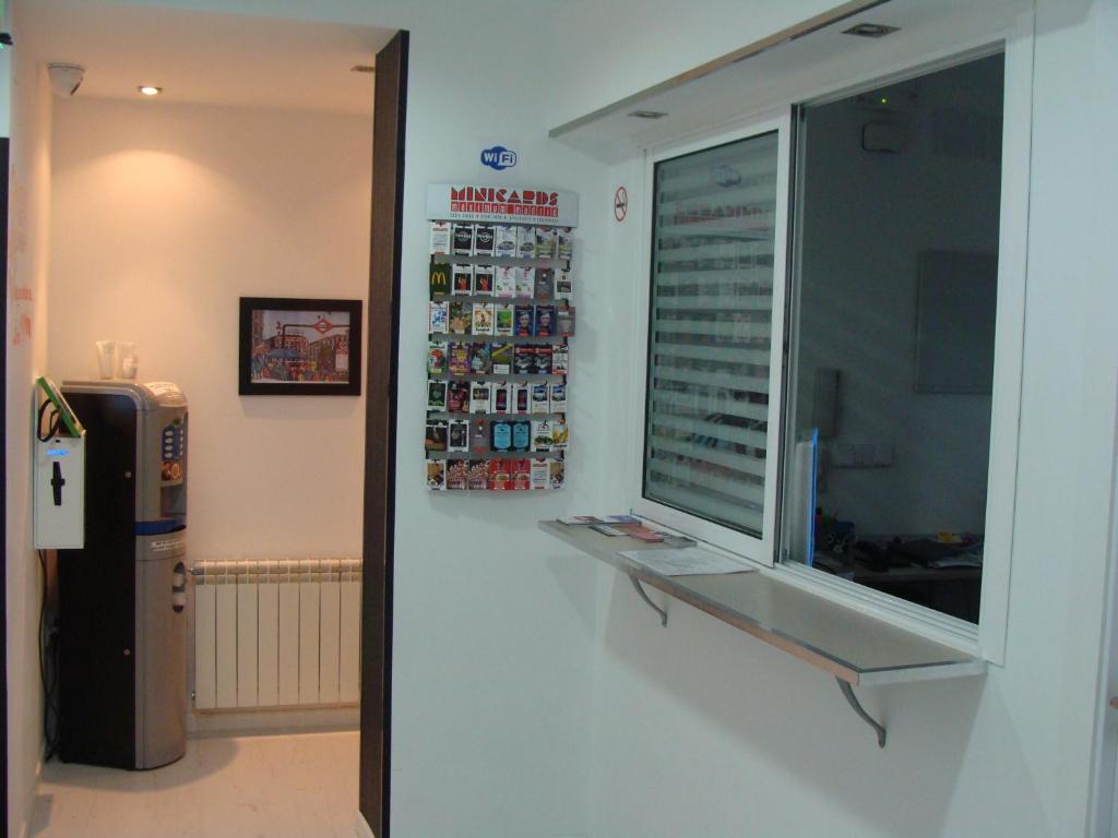 TV a/nebo společenská místnost v ubytování Hostal JQ Madrid 1