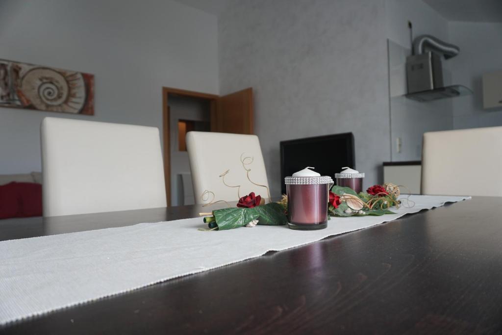 Televízia a/alebo spoločenská miestnosť v ubytovaní Apartment Kozina