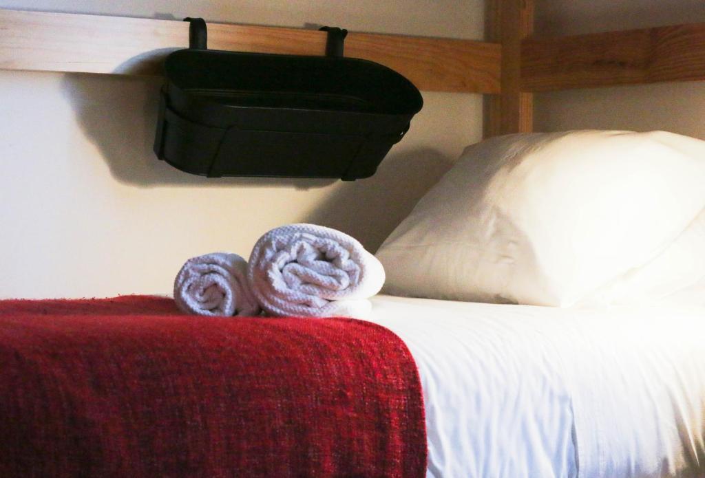 Postel nebo postele na pokoji v ubytování Procyon Boutique & Suites